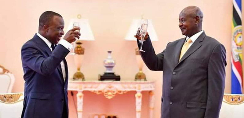 President Museveni bidding farewell to outgoing French Ambassador H.E Aniambossou 