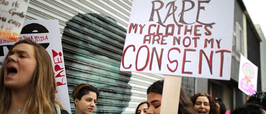 People participate in a protest march for survivors of sexual assault and their supporters in Hollywood, Los Angeles, California. Courtesy photo