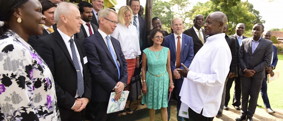 President Museveni chats with Swedish investors at State House Entebbe.PPU Photo