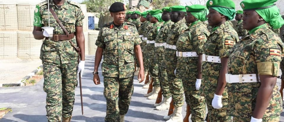 Gen Mbadi inspecting a parade mounted by UPDF AMISOM troops. DPU photo