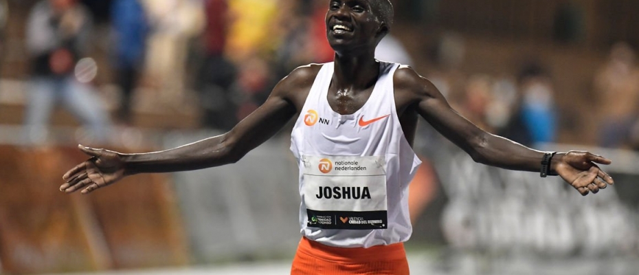 Ugandan athlete Joshua Cheptegei celebrates after breaking the 10,000m track world record during the NN Valencia World Record Day at the Turia stadium in Valencia 
