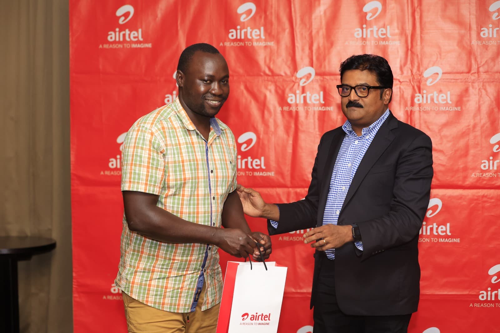 Airtel Uganda Recognizes Emuk Benjamen as Most Outstanding Journalist in Uganda