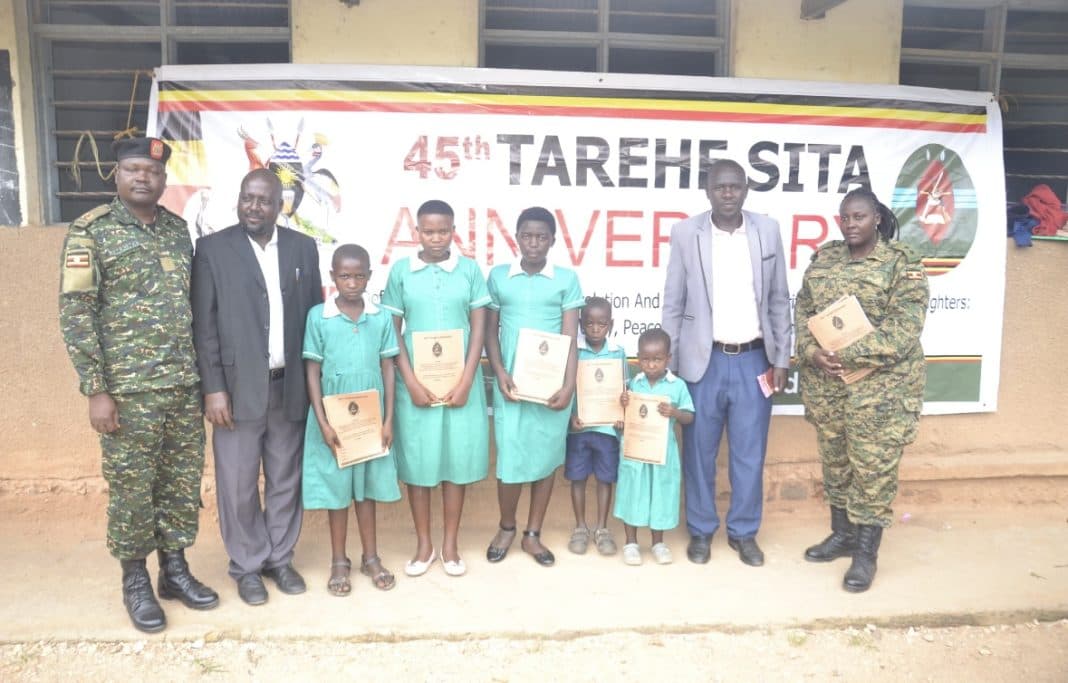 UPDF Donates Scholastic Materials to 93 Schools in Kigezi Region