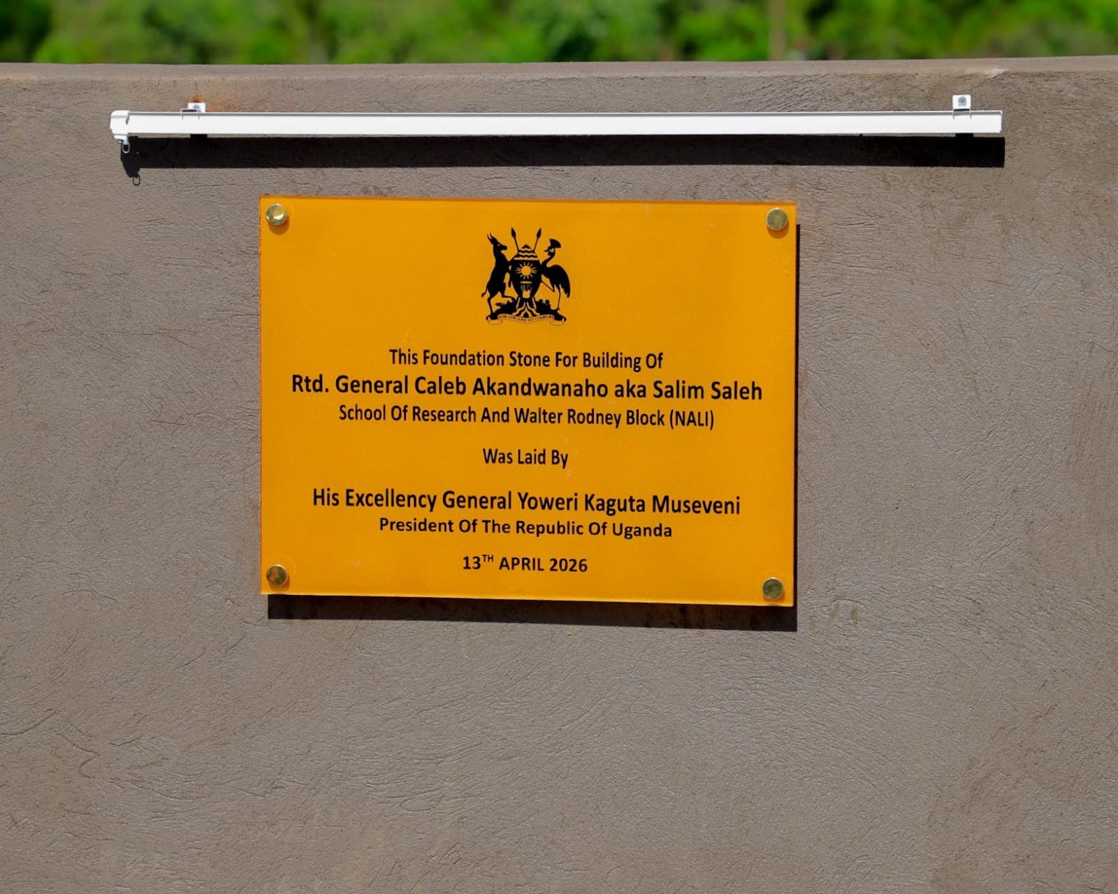 The foundation stone for a building that will house the Rtd Gen Caleb Akandwanaho School of Research and Walter Rodney Block.