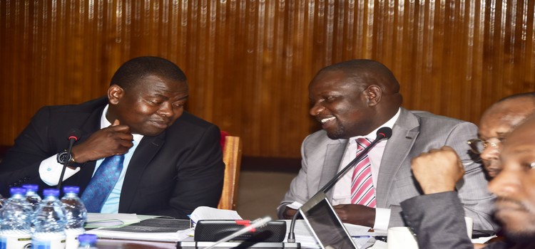 COSASE vice chairperson Hon Ibrahim Kasozi interacting with Hon Mwiru Paul during their meeting with UEDCL