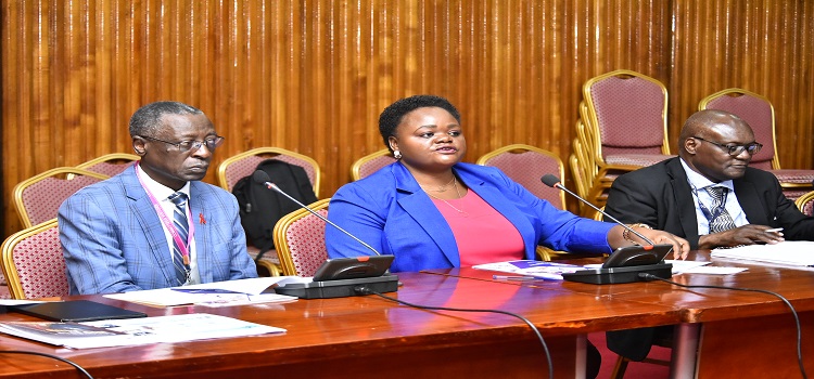 Hon. Kayagi Sarah (middle), Dr. Eddy Mukoyo(far right) and Dr. Steven Watiti during the presser by the committee on HIV related matters