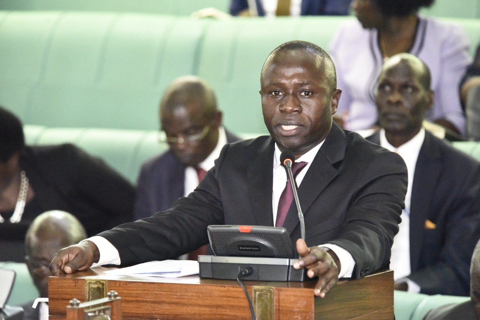 Sports Minister Peter Ogwang on the floor of Parliament