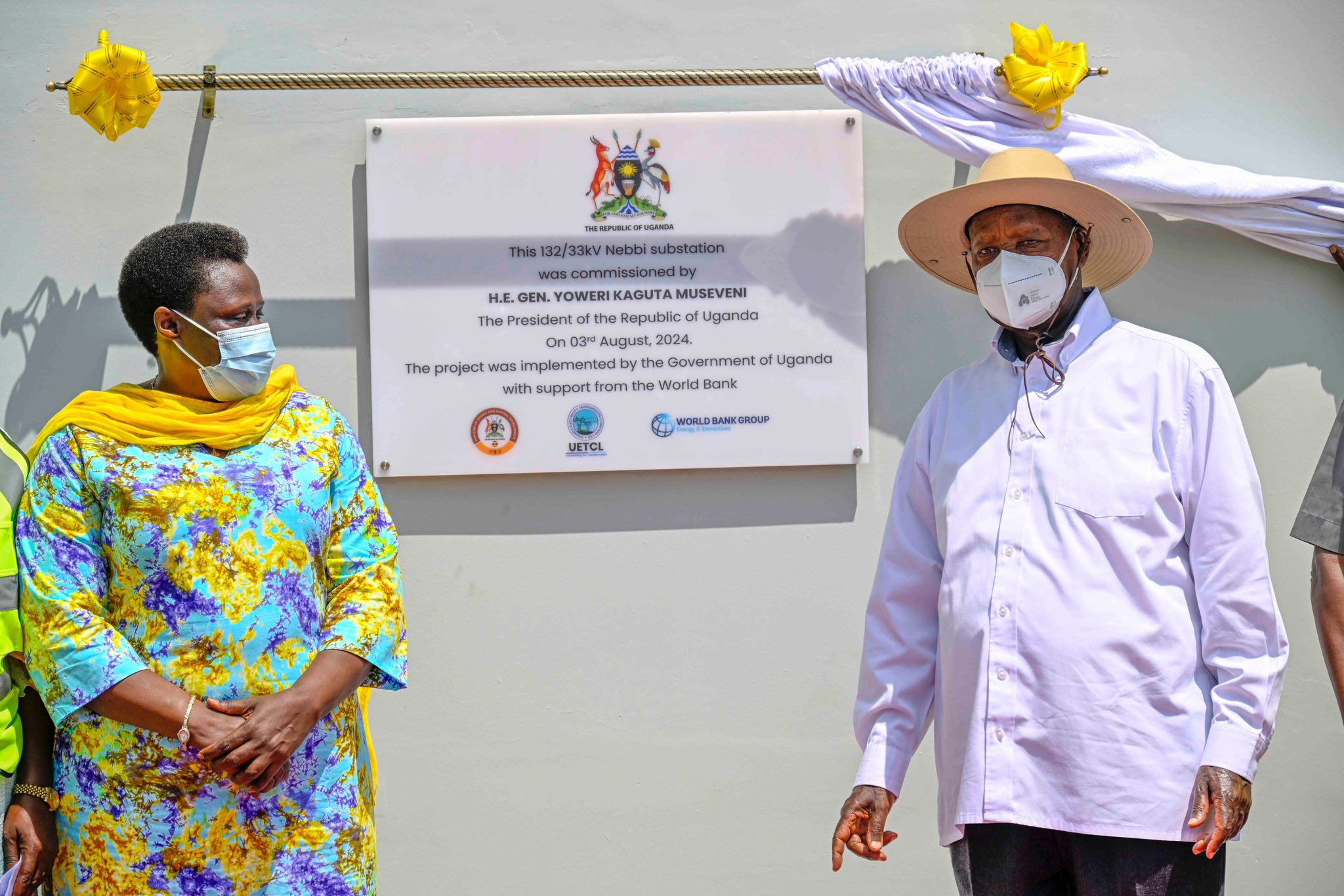 President Yoweri Museveni (Right) commissioning the 132KV Kole-Gulu-Nebbi-Arua transmission line, connecting the West Nile sub-region to the national electricity grid.