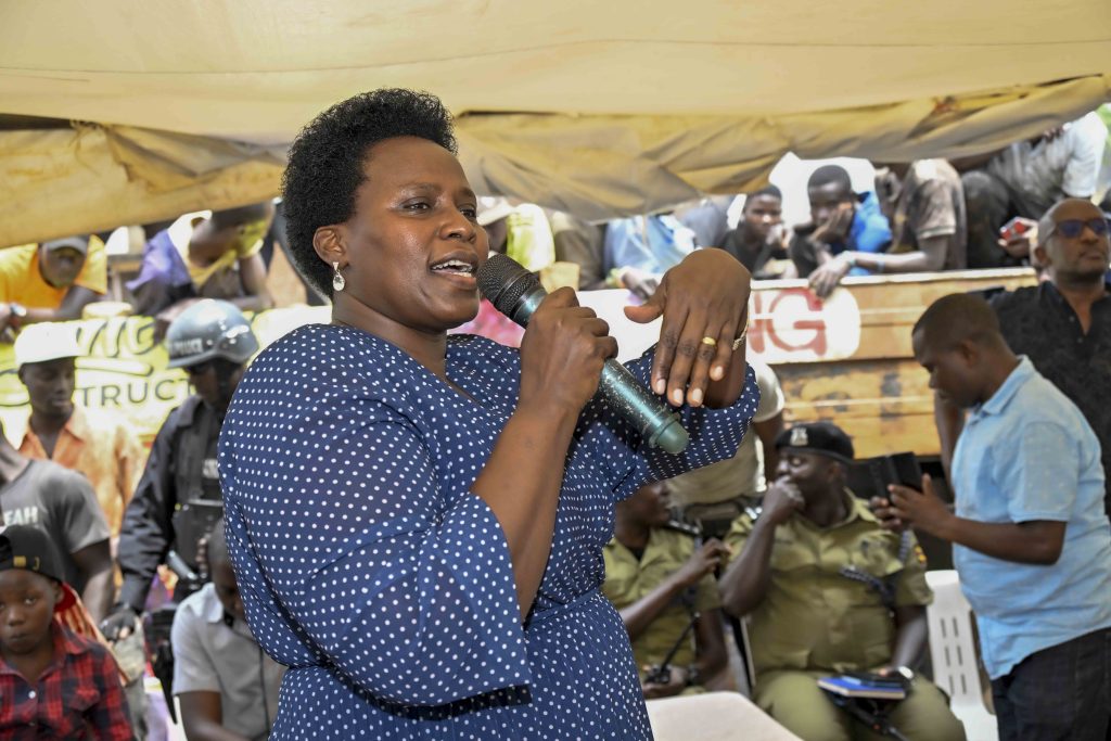 State House Comptroller Jane Barekye making her remarks before the handing over 36 boda bodas that is 3 bikes for each of the 12 SACCOS in the Kampala Ghetto Structures 