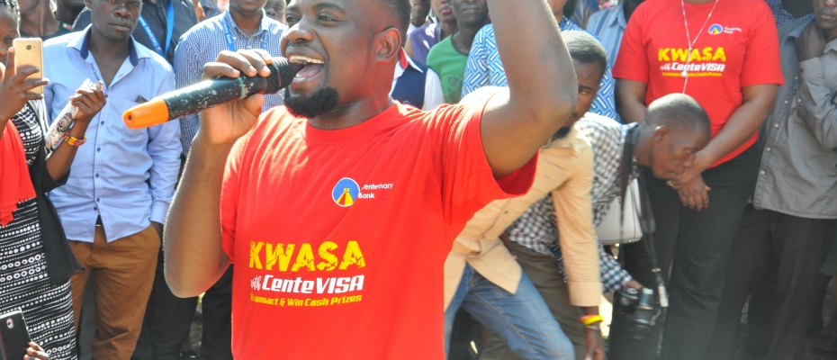 David Lutalo, the 'Kwasa with CenteVisa' campaign ambassador, entertains customers at campaign launch