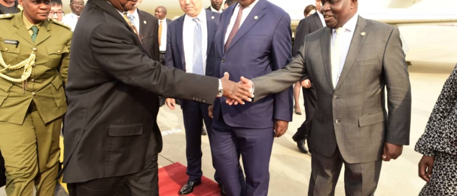 President Museveni being welcomed by Uganda's Ambassador to China, Dr Crispus Kiyonga. PPU photo