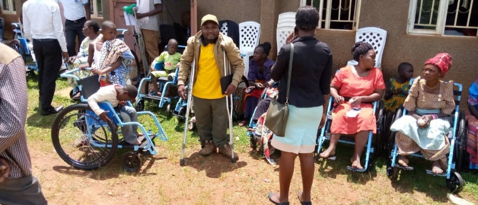 Buikwe district PWDs receive mobility facilities on Wednesday. Courtesy photo