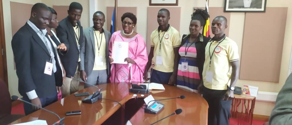 Speaker Rebecca Kadaga (C) with the youths from Gulu