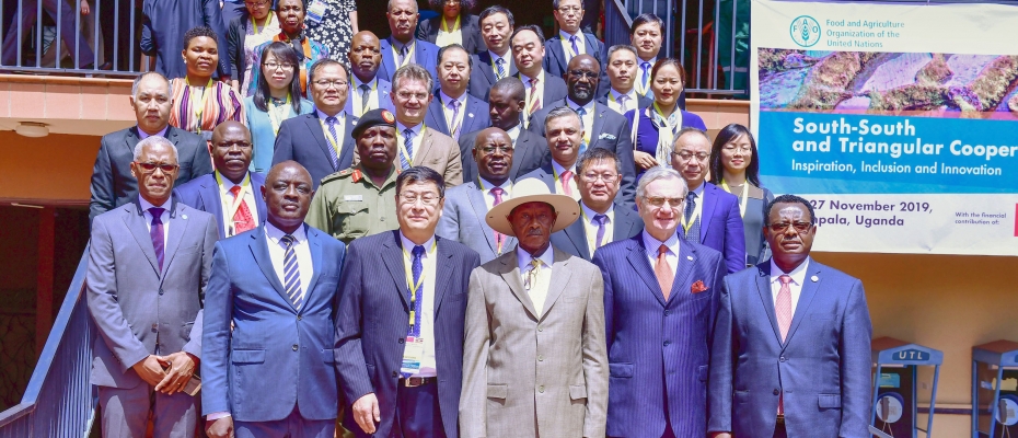 President Museveni shares a photo moment with some of the delegates attending the South-South Triangular Cooperation conference at Speker Resort Munyonyo. PPU Photo