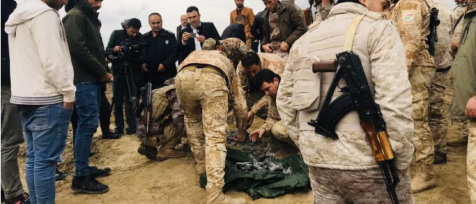  Iraqi security forces find and collect the pieces of missiles as they gather to inspect the site after Iran's Islamic Revolutionary Guard Corps (IRGC) targeted Ain al-Asad airbase in Iraq, a facility jointly operated by U.S. and Iraqi forces, at Bardarash district 