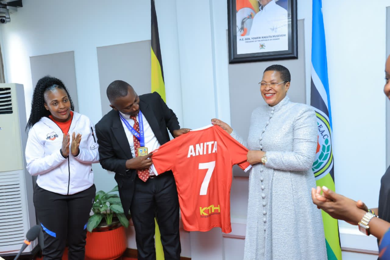 Speaker receives a jersey from Kitara FC President Deo Kasozi