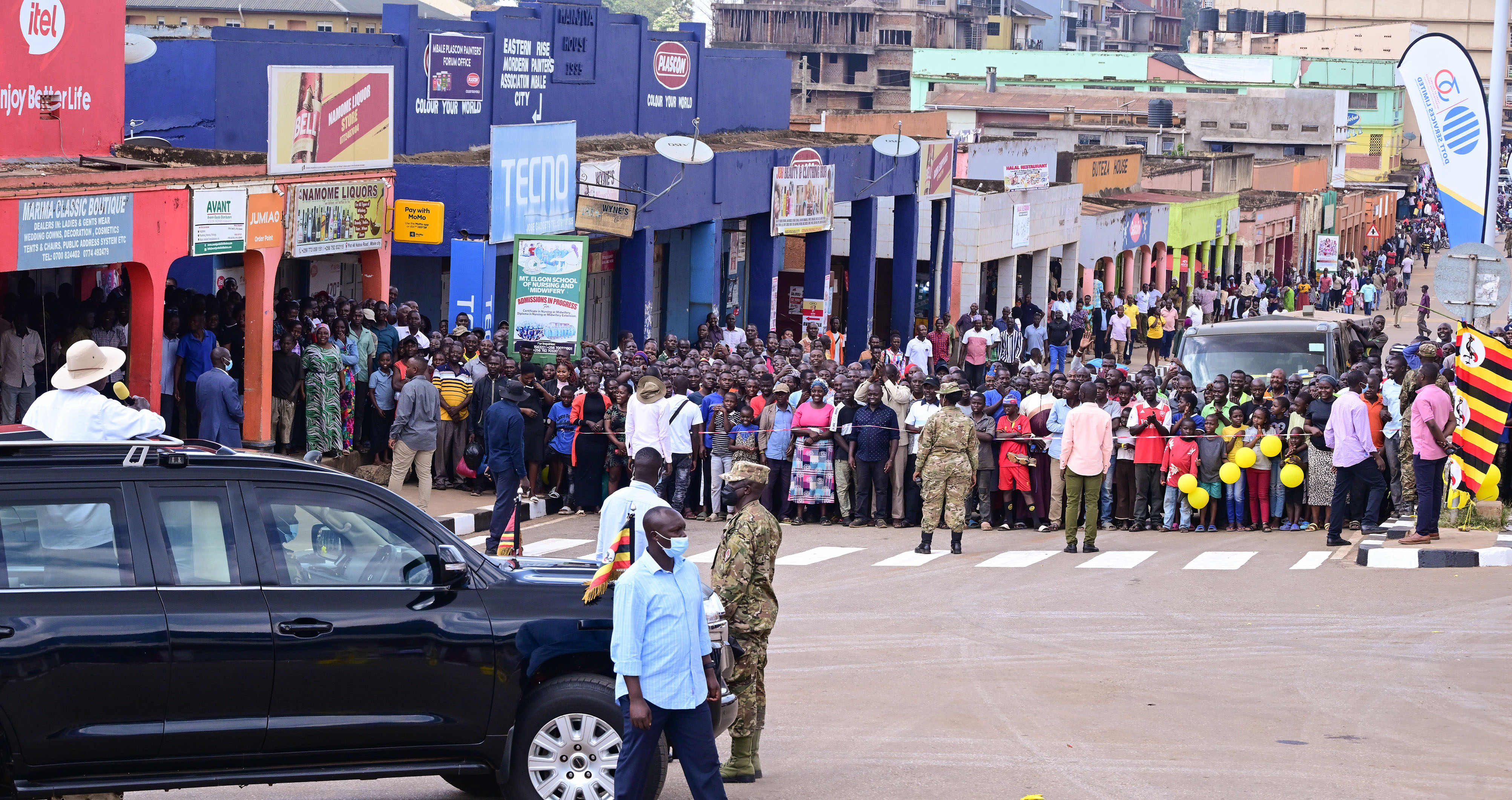 President Museveni accompanied by Ministers Kania Obiga and Persis Namuganza and several political leaders from Mbale tour Naboa street in Mbale City shortly after commissioning the newly 