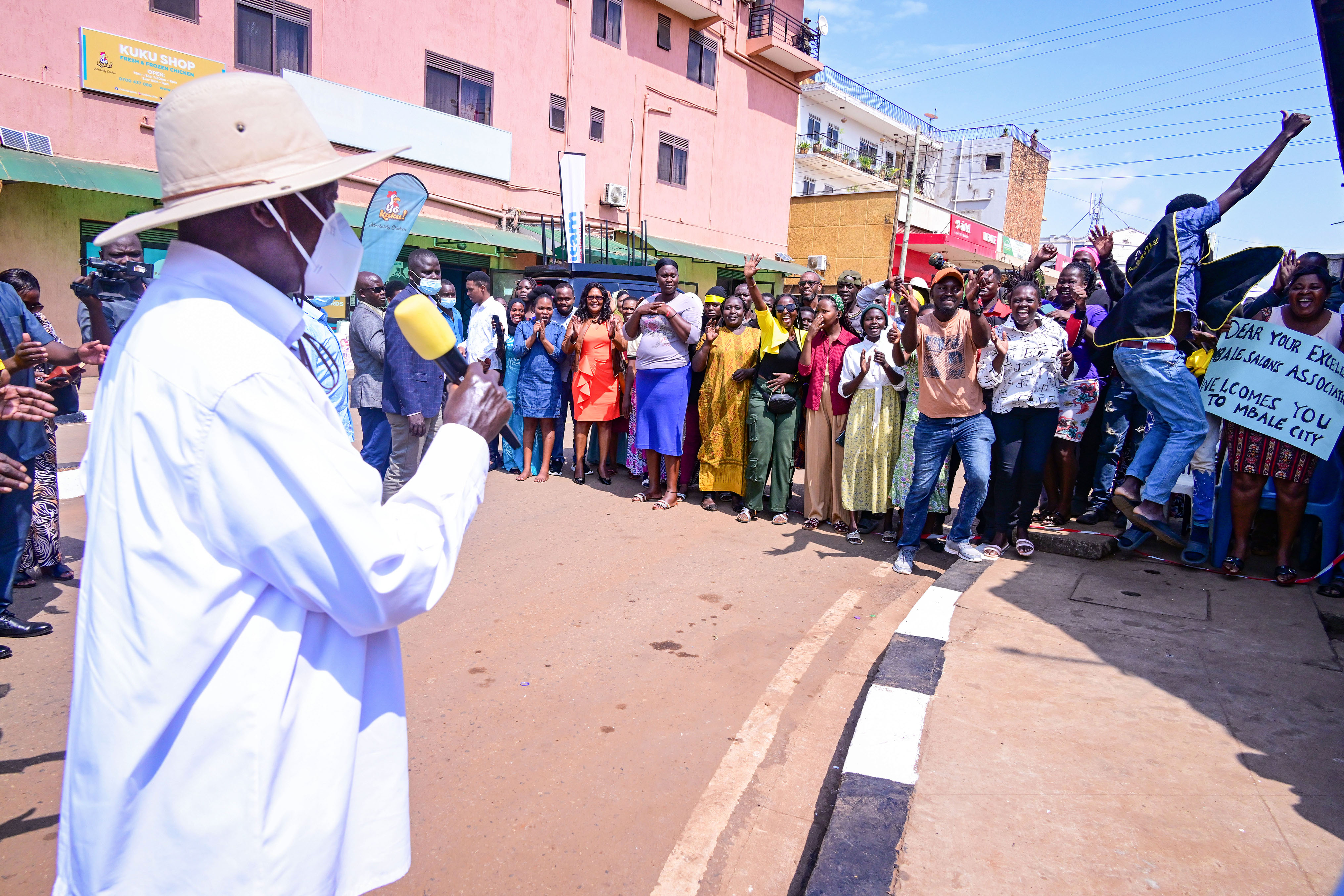 President Museveni accompanied by Ministers Kania Obiga and Persis Namuganza and several political leaders from Mbale tour Naboa street in Mbale City shortly after commissioning the newly 